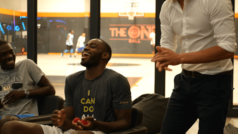 Man laughing at a magic trick