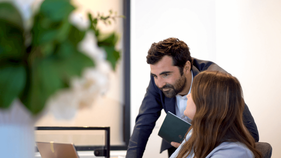 Two people working together